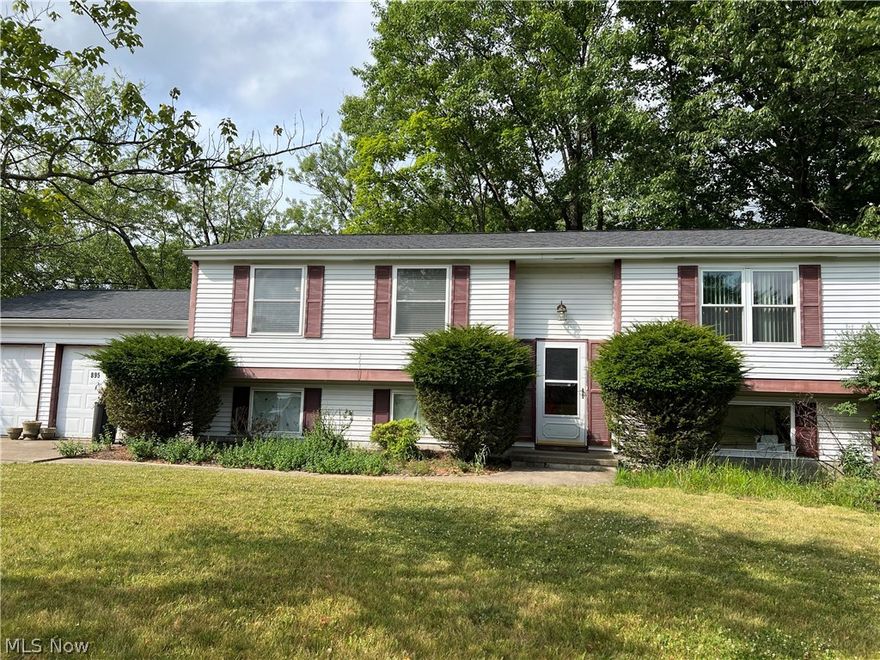 This Bi-level home is in a great location in Medina between the historic square and I-71 with easy access to both! There is an updated kitchen with Farmhouse style sink, Gourmet gas range, plenty of granite counters and cupboard space with updated wood flooring. Also on the first floor is a living room and Dining room leads to a beautiful deck overlooking a large park like yard setting.There are three very good-sized bedrooms with an additional 11 x 12 room that can be a great home office or a possible fourth bedroom on the first floor. Two full bathrooms upstairs and a 1/2 bath on the first floor.If you are still in need of additional room, there is a relaxing 21 x 17 family room downstairs for you.