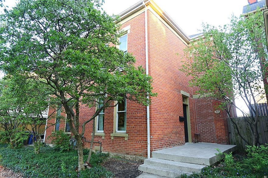Showing start Friday 4/26 on this hard to find 3 bedroom condo with fenced backyard and 2 off street parking spaces. This is the one you've been waiting for. You will enjoy this urban town home featuring large spacious rooms,tall ceilings,hardwood floors,industrial style kitchen with concrete counters, exposed brick and GE café Series stainless steel appliances. The first floor is complete with half bath and glass door leading to the fenced yard with deck and patio. The second floor features an oversize owners bedroom, 2 more spacious bedrooms all with ample closets, a chic full bath with clawfoot tub, floating vanity with concrete counter and Encaustic Cement Tile tile floor.