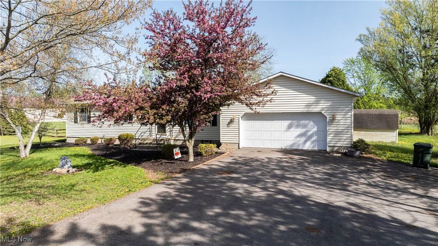 Immaculate ranch home on over 2 peaceful acres offers the perfect blend of rural charm and modern updates. This 3-bedroom, 3-bath home features a spacious primary suite with a full bath and a large walk-in closet that could be converted to a first-floor laundry. The kitchen offers beautiful, durable countertops, modern appliances, and plenty of cabinetry. The finished basement has been recently redesigned with all-new flooring and fresh paint, adding flexible space perfect for a rec room, office, or guest suite. Spend your summers on the screened-in porch, listening to the frogs by the neighboring ponds. Major updates include a new roof (2020), furnace and A/C (2017), water heater (2021), asphalt driveway (2022), wood flooring, interior doors, and fresh paint throughout (2021–2022). Move-in-ready, this serene retreat offers comfort, space, and peaceful country living—just minutes from Lodi.