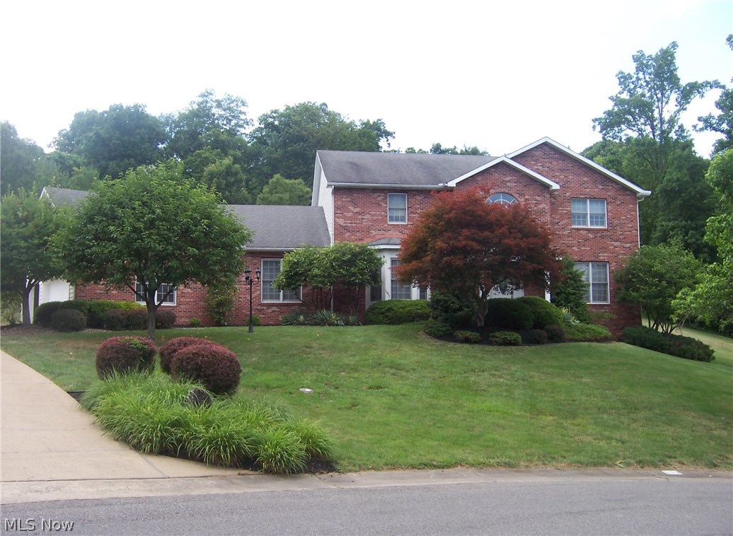 Beautiful two story home on 2.59 acres in Greenmont Hills. Front entrance with new door and roof overhang installed six years ago. Master bedroom on first floor with large walk-in closet and Jacuzzi bath. Three vehicle garage with openers and possible fifth bedroom in basement are among the many features this property has to offer. Lovely crown molding throughout the first level. Also, screened-in porch on rear of house.