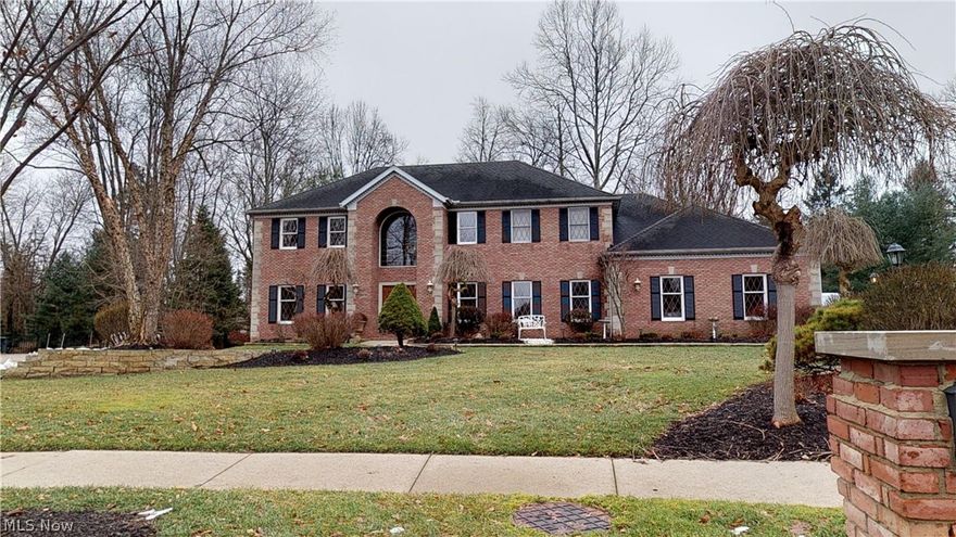 This desirable 4 Bedroom 3.5 Bath is in Brecksville, Ohio. Exquisite 3,300 square foot newer build (1992), is located in Emerald Woods neighborhood and has a completely finished basement with a full bath, jacuzzi bathtub, fireplace, and additional entertainment room/yoga/fitness room. Fully updated and impeccably maintained with granite countertops, central air/heating, with an attached 4 car garage. Master bedroom includes a full walk in closet and master suit/retreat with a jacuzzi tub. Also includes a den/office, laundry room, updated security system, and outdoor hot tub/jacuzzi. This 7/8 of an acre lot is located just a couple miles from Brecksville recreation center, town/shopping center, park system, & offers excellent city services, with a highly rated school system.