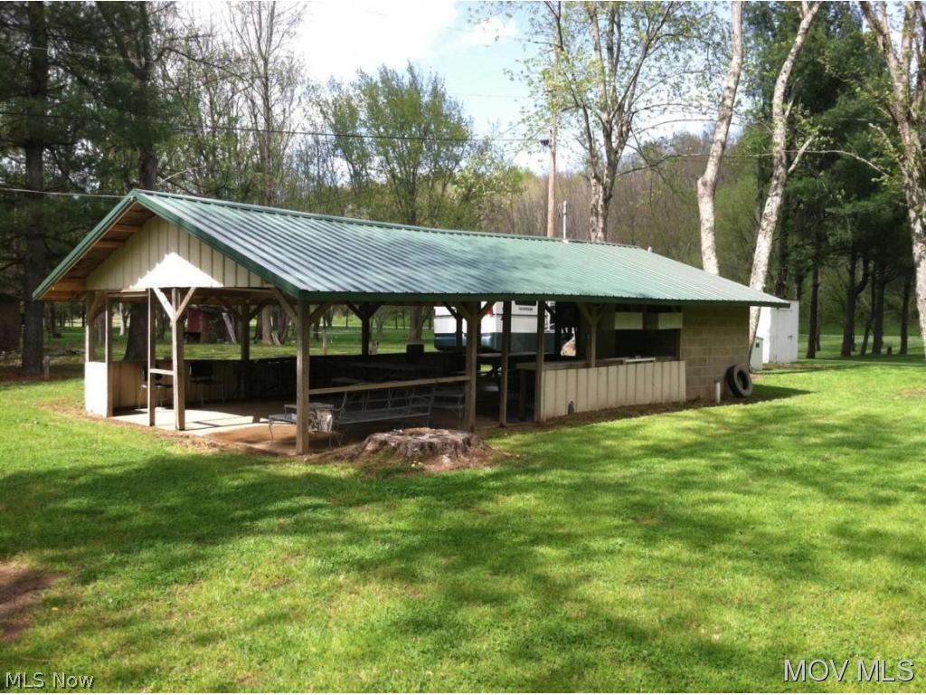 Summer campsite. Nearly 1 acre of flat land on the river. Lot includes picnic shelter with a built in bathroom and shower. 3 sites to hook up to water, electric and septic. 1500 gallon septic tank already installed on the property. Could also be used as a potential income generating property. Elem: Coolville Elementary Elem/Bus: Y JrHigh: Federal Hocking JrHigh/Bus: Y High: Federal Hocking High School High/Bus: Y Fire: VOL Police: SHF