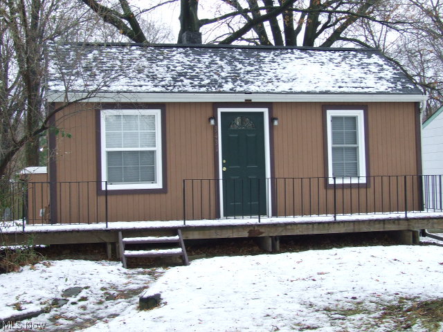 Can you say NEW?! 2 Bedroom Ranch with updated kitchen, bath, carpet, linoleum, paint, lights, cupboards, counters, brand new kitchen appliances. All freshly painted-inside and outside. Newer winds, doors, screens, roof, boiler, insulation. Partially finished rec room with small walk-out door. Large, detached 3-car garage, perfect to store business supplies or car buff's dream (steel I-Beam runs across center). Small but efficient!! Dead-end street.