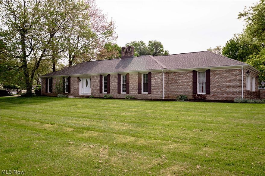 Welcome to your dream home in the desirable Colonial Hills neighborhood in Perry Local School District. This spacious three bedroom, two bathroom brick ranch offers the perfect blend of comfort and style. The main level boasts an inviting open floor plan featuring a modern kitchen with granite countertops and a large breakfast bar that seamlessly flows into the eating area with a fireplace and bamboo flooring. Step through the patio door onto the covered back porch overlooking the private fenced in backyard and sparkling inground pool, ideal for family gatherings and entertaining friends. Relax in the sunken living room with yet another fireplace or utilize the versatile bonus room as a formal dining room or a home office. Convenience is key with a 1st floor laundry room. Retreat down the hallway to the generously sized owners suite with his/her closets and an updated full bathroom. Two more ample sized bedrooms and another updated full bath complete the main level. The full basement has huge potential to be finished while offering plenty of room for storage. Additional features include a 2 car attached garage with openers, a new roof, a newer furnace and A/C, updated flooring and fresh neutral paint throughout and a private fenced in back yard. With it's prime location in a fantastic neighborhood, this home epitomizes comfort, convenience and luxury. Don't miss out on this opportunity to make this your forever home.