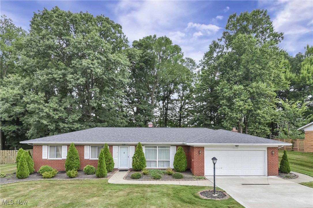 Welcome to this beautifully maintained former model home in the heart of Macedonia-offering comfort, upgrades, and an unbeatable location. This 3-bedroom, 2-bathroom brick ranch is move-in ready and packed with features that set it apart. Step inside and enjoy the spacious layout, enhanced by a thoughtfully designed addition that provides more square footage than comparable homes in the neighborhood. The primary suite includes a private en-suite bath, adding convenience and privacy. You'll appreciate the peace of mind that comes with major updates already done-newer roof, furnace, A/C, and driveway. Outside, the parklike backyard is a true retreat, complete with a wood deck perfect for entertaining or relaxing. Two storage sheds provide ample space, with one ideal as a workshop or hobby space. As a former model home, this property comes with thoughtful touches throughout. Located minutes from shopping, hospitals, and major highways with easy access to Cleveland, you’re also just a short drive from the racetrack, casino, and other local attractions. Don’t miss the opportunity to own this standout home in a sought-after community; schedule your showing today!