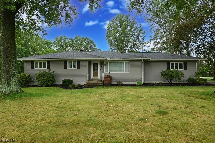 Welcome to this updated and upgraded ranch home!  This house features open spaces for entertaining, new luxury vinyl throughout the entire main floor and an updated bath which includes a gorgeous new vanity with granite counter and double sinks, plus a standing shower with ceramic tile finish. Your kitchen has been thoughtfully designed with plenty of room for food prep in addition to a stationary coffee bar area adjacent to the dining room. Three sizable bedrooms are available and your basement family room is a huge space for gaming, movies, exercise, or whatever suits your fancy!  With a two-car attached garage this winter will be a breeze - no more scraping car windows in the morning. And - until that last leaf falls you can enjoy the sunshine with your spacious yard and patio. There is an invisible fence for your fur-baby, too! Call your favorite agent before this one gets away!  (Tallmadge Schools)