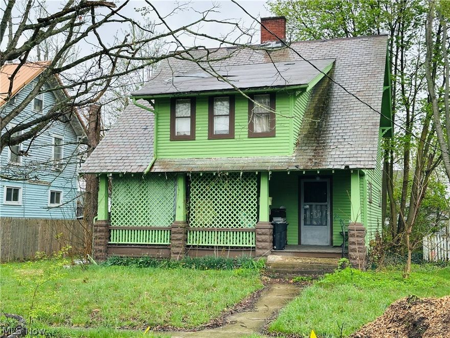 Welcome to 4721 Topper Avenue — a classic early 20th-century home full of character and potential. Offering approximately 1,424 square feet, this property features a flexible layout along with a welcoming front porch that highlights its original charm. Inside, you’ll find a traditional floor plan with spacious living areas and the opportunity to restore and customize to your vision. The home retains many original features, including hardwood flooring beneath existing carpet and plaster walls that reflect the craftsmanship of the era. A walk-up third-floor attic provides additional bonus space, offering flexibility for storage, workspace, or future use. Situated on a city lot with rear alley access, the property offers convenient off-street parking options and a layout well-suited for future improvements. This property will require updates and renovation and is best suited for investors, renovators, or buyers looking to build equity through improvements. Located near local amenities, schools, and just a short drive to Lake Erie and Historic Ashtabula Harbor. Seller is motivated—bring all offers. Property being sold as-is.