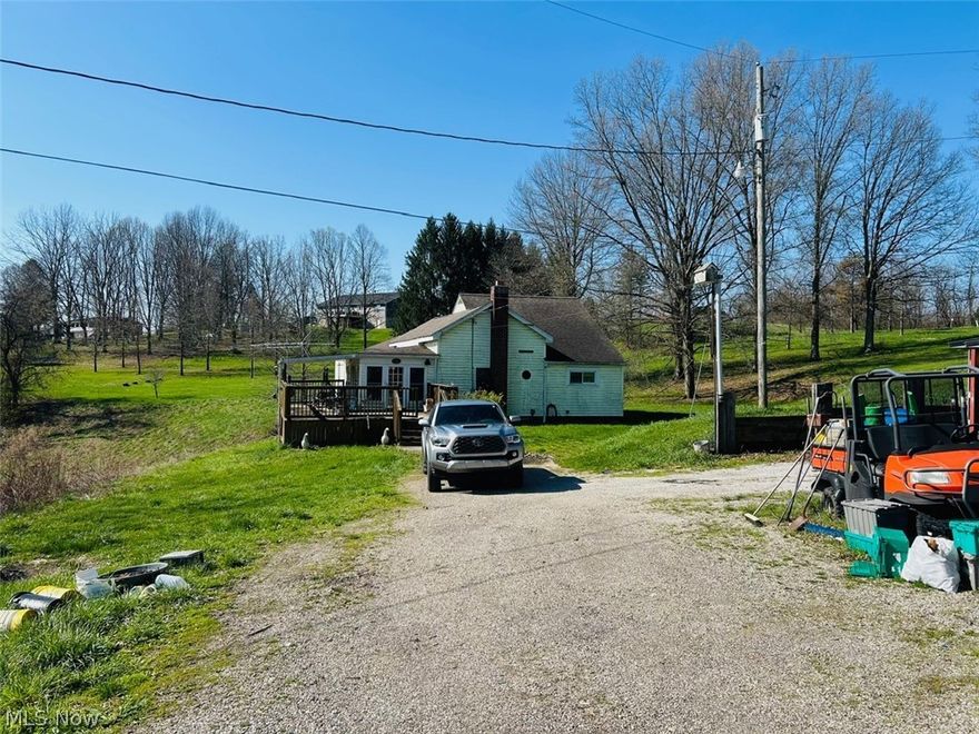 20 plus acres with a house to make your own. 4 bedrooms with 1st floor bath. 4 stall outbuilding to keep equipment & supplies. Large garage. Close to town- 5 minutes from downtown Toronto. This property has tons of potential! Priced to sell!