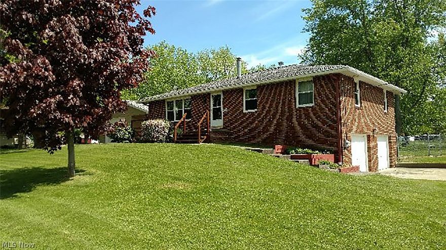 Quality Brick Ranch on 3/4 acres with nice setting.  Main level features eat-in kitchen with appliances, living room, 3 bedrooms and full bath.  Partially finished basement with glass block windows, laundry including washer & dryer, family room with wood burner & full bath.  Detached 24x48 garage/shop with concrete floor, heat, electric and porch. Two car attached garage & Buckeye barn.  Fenced in backyard.  Many updates throughout the years.  This one won't last long better check it out!