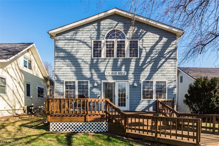 A lakefront home with beautiful views of the lake located across from the historic Cranberry Bog where you can enjoy the waterfowl, wildlife and nature without leaving the homes wonderful wooden deck. The home enjoys a fenced in backyard with a perennial garden and a covered back porch to enjoy summer time with family and friends while entertaining and firing up the gas grill built into the cook center. The home has three watercraft slips conveniently located in front of the home and a few steps from the deck making boating, fishing, tubing and jet skiing easy, run and lake living a dream come true. The home has an open floor plan, a large kitchen with an island, gas fireplace, a huge 2nd floor master bedroom with a large walk in closet with wonderful views of the lake and the sunrise to the east. The property offers an extra lot with a two-car garage, car port and parking for 10 or more vehicles. Parking for the many friends and family that will visit to enjoy lake life with you. The