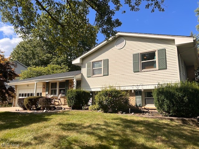 Welcome to this spacious 4 level split in a great neighborhood! This 4 bedroom 1 ½ bathroom home has plenty to offer. The main level has the living room and eat-in kitchen with a movable island. The kitchen opens to the large 3-season room. There are 3 bedrooms and 1 full bathroom upstairs with a double vanity. Downstairs is the 4th bedroom and ½ bathroom, as well as the laundry room and a nice family room with a gas log fireplace. The 4th bedroom could be used as an office or bonus room. Outside is a paver patio and great yard! All the appliances stay. With a motivated seller, make your appointment today!!