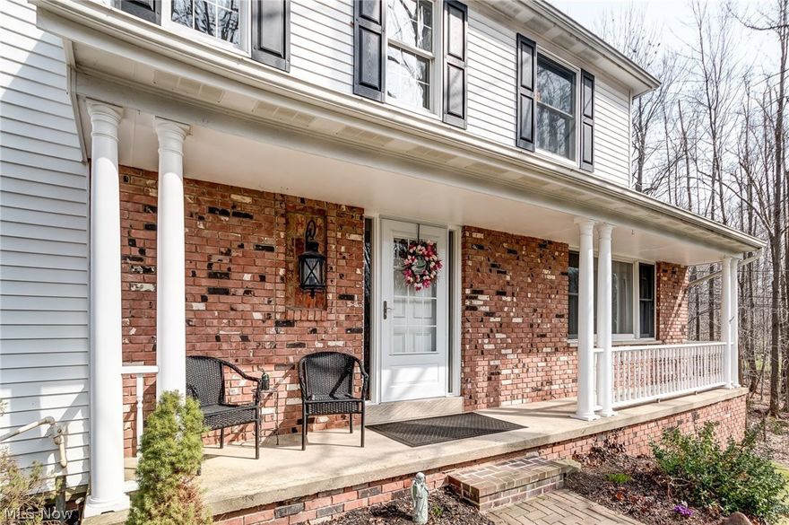 Spacious Colonial with deep setback and perched atop a beautifully wooded site! Rolling terrain - 2 separate parcels totaling 1.63 Acres with meandering creek! Well maintained with quality features. Absolutely stunning sun room that features corner fireplace, slate flooring, skylights and a wall of windows with sliding doors providing access to the two level deck! Large kitchen with ample cabinet and counter space, pantry closet and cozy dinette area with sliding doors providing second access to the deck! Family room with brick wall wood burning fireplace. Oak flooring thru out, freshly painted thru out, walk-out finished basement with unique pub room. There's More!