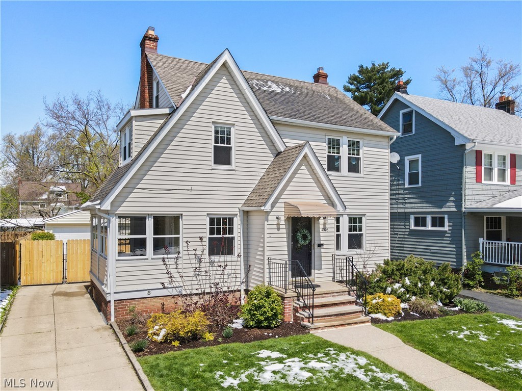 Take a look at the immersive 3D video for a detailed virtual walk-through. A rare combination of features that is hard to find: renovated kitchen with gorgeous, white cabinets w/dovetailed, soft-close drawers, finished recreation room in the basement with a full bath, huge, finished third floor and gorgeous landscaping with a new privacy fence. Timeless colonial with a huge living room with a woodburning fireplace and hardwood floors. Off the living room is a fabulous 3-season, enclosed porch perfect for reading, morning coffee or quiet solitude. A dining room with lots of natural light and an oversized, remodeled kitchen with load of cabinets means storage galore and functionality and space to satisfy every culinary desire. The 2nd level has three bedrooms which share a renovated hall bath. New carpeting just installed (staircase to 2nd level, hallway and all 3 bedrooms). Small enclosed rear porch on 2nd perfect for additional closet, storage or another getaway space. Head up to the 3
