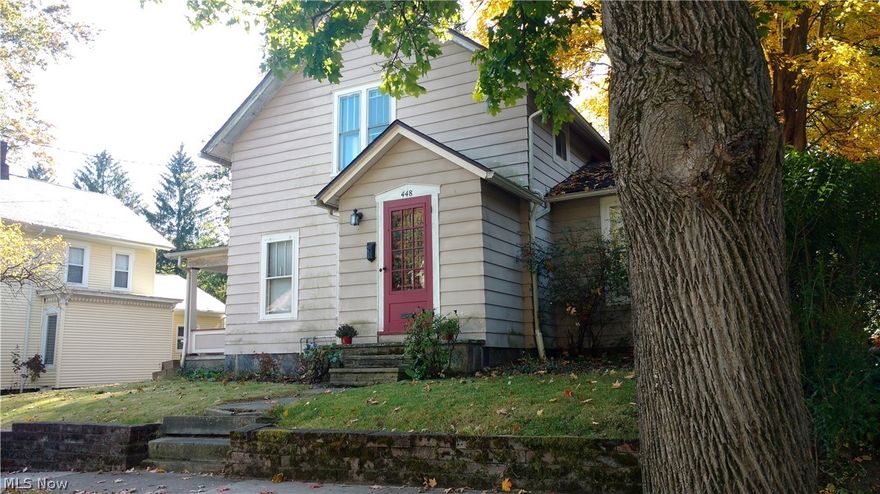 Make an appointment today to view this beautiful updated century home in Kent's Historic district.  This unique home is within walking distance to downtown Kent, Library and KSU Campus.  Lovely older neighborhood with many shade trees, parks and schools nearby.  Home is nestled on large deep lot with 2 car garage.  Updates include 30 year roof installed 13 yrs ago.  Furnace/AC new in 2013.  Hot water tank 2014.  Totally replaced wiring, service box and plumbing.  Owner restored oak flooring and crown molding and fireplace on first floor.  Second floor needs some cosmetic work, finish with your own decorating ideas.  Three bedrooms and two full baths.  "Buy as is", seller to do no repairs.  She will be leaving paints and all materials for future owners.  See list in home of all updates and items left behind, if buyer requests.