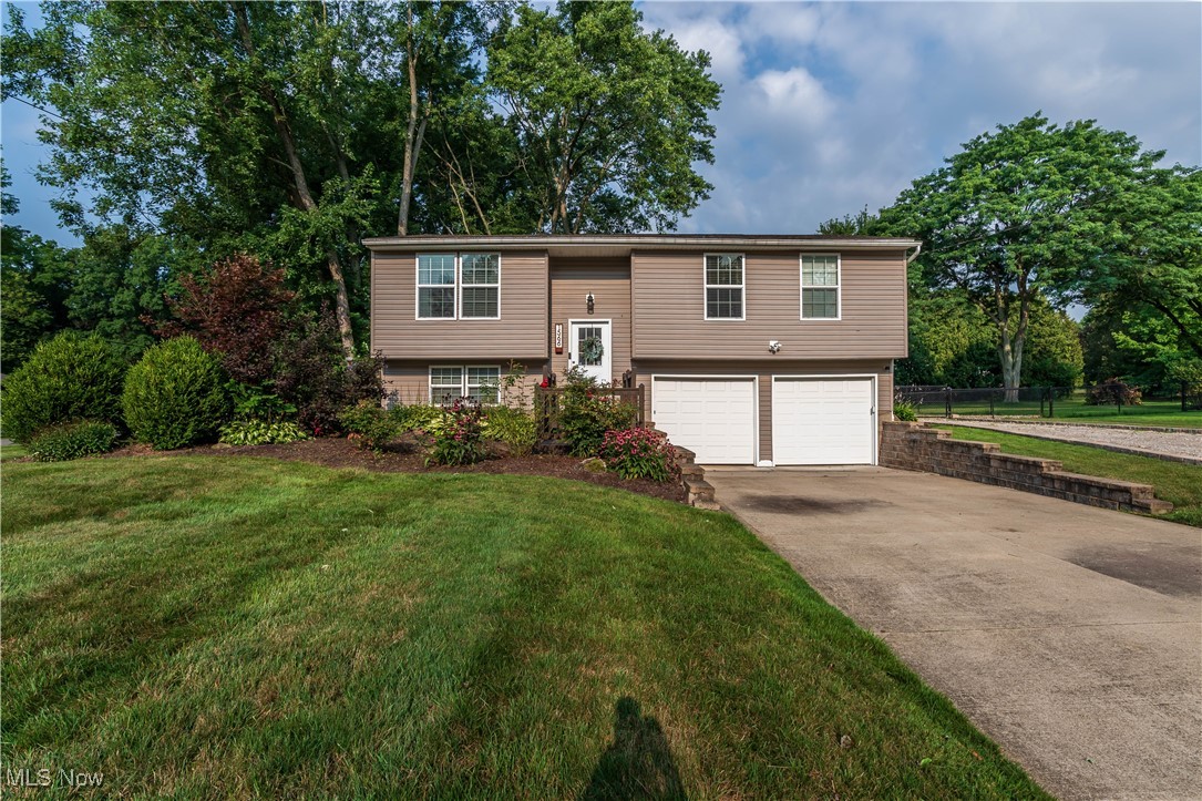 Welcome to this beautifully updated home located at 1566 Sunnyacres Road in Akron, OH. This stunning property boasts a fenced-in back yard and an additional six car garage, perfect for the car enthusiast or hobbyist. This garage offers ample storage space for vehicles, tools, and equipment. Step inside to find a completely updated interior featuring three bedrooms and one full bath on the main floor. This dream kitchen has all new Bosch appliances, sleek cabinetry, and modern finishes. The open concept living and dining area is ideal for entertaining guests or relaxing with family. Downstairs, you'll find a spacious lower level with an additional living room and a convenient half bathroom. This versatile space could be used as a home office, gym, or playroom. Outside, the fenced-in back yard provides privacy and security for pets and children to play. Call Brandon to schedule a private showing today !