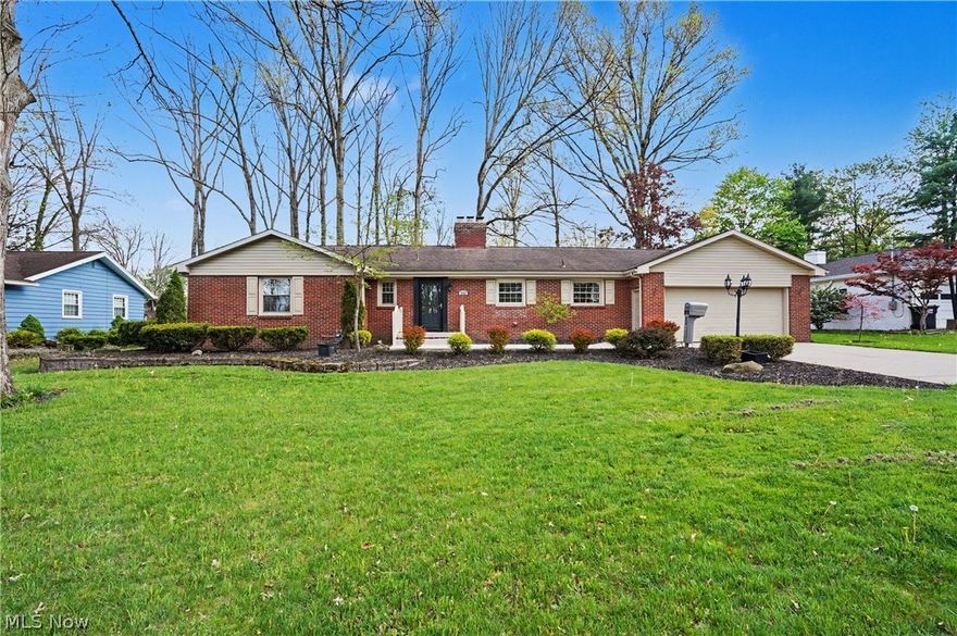 Welcome to this beautifully updated 2-3 bedroom, 2 full bath Brick Ranch in one of Canfield's most desirable neighborhoods. Move-in ready and offerig true one-floor living, a rare find in Canfield. The bright, airy interior features a stunning remodeled eat in kitchen with Quartz countertops, pretty subway tile backsplash, and stainless steel appliances. The inviting living room offers bamboo hardwood flooring, a striking stone fireplace and a large bow window, The living room flows seamlessly into the formal dining area. A spacious family room with a brick fireplace opens to a private, park-like backyard with patio, shed, and mature landscaping-perfect for relaxing or entertaining. The completly updated hall bath includes a tiled walk-in rain shower and large vanity. The Master bedroom features ample closets and a private en-suite bath. The 3rd bedroom offers flexible use with main-floor laundry hookups (additional laundry hookups in basement). Impeccably clean home, lots of curb appeal galore and meticulous landscaping. Ideally located near shopping, dining and schools. This may be the one you were waiting for.