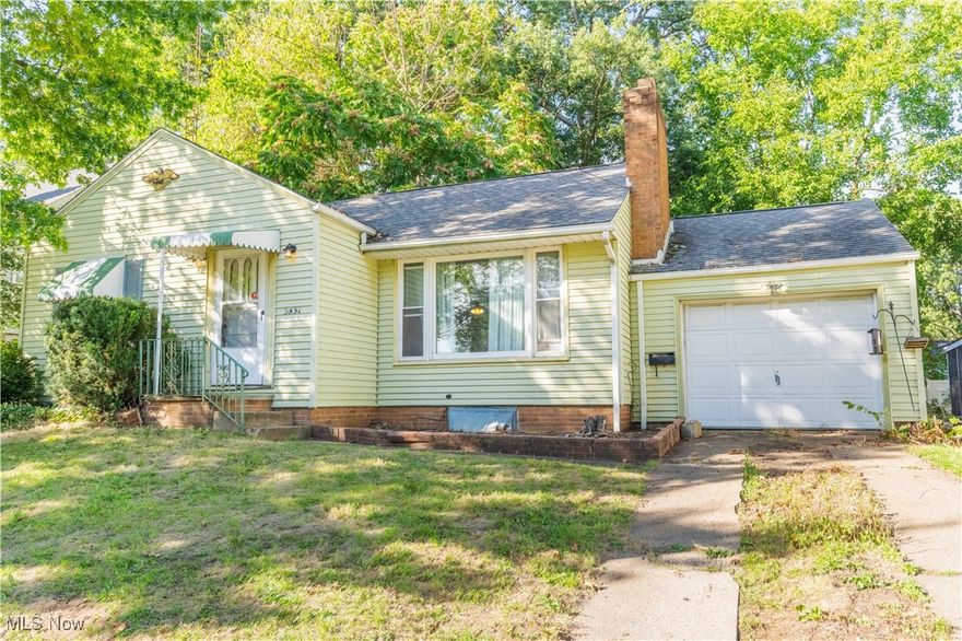 Welcome to this 2 bedroom, 2 bath home with plenty of potential and character. The inviting living room features large windows that fill the space with natural light. The large living room also offers a wood burning fireplace, perfect for the cooler weather! The dining room is directly off the living room with an open, inviting space. From here, you can also access the back patio. You'll also notice the built-ins in the dining area giving great character. Both bedrooms as well as the updated bathroom are down the hall. Off the kitchen, you'll find the basement which includes a second fireplace and bar area that offers additional possibilities. The fenced-in backyard, and 1-car garage add practicality and value.

With a convenient location close to shopping, dining, and everyday amenities, this home offers a solid foundation and the opportunity to bring your own style and updates. A great option for first-time buyers, downsizers, or investors.