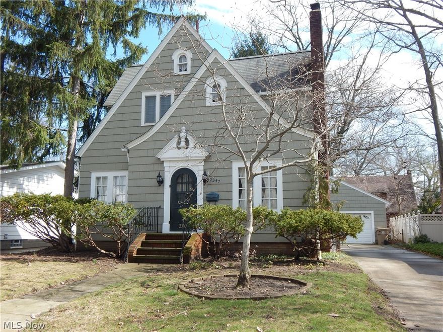 Charming Chalet Colonial, Freshly painted interior, hardwood floors on first floor and master bedroom, Updated newer kitchen with dinette.  
Formal dining room with charm and character. Enjoy the rear patio overlooking manicured rear yard. Newer oversize two car garage. 
Full basement with mini workshop, shower and much more. Near Broad Blvd not far from New Portage Crossing and downtown entertainment area.