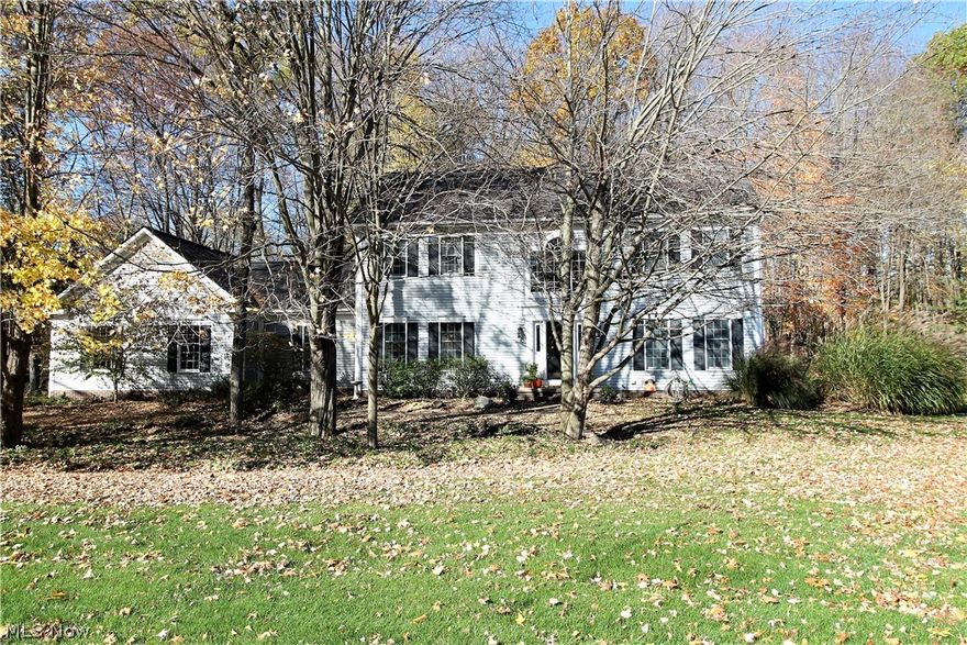 Elegant simplicity in this four bedroom, two and half bath colonial home. Come on into this gorgeous entrance way offering wood flooring, dining room, living room, family room, office, eat in kitchen. There is a large sunken family room with slate tiles, gas fireplace with coffered ceilings and large window offering tranquil views of the backyard. The eat in area offers built in cabinets, and sliding glass doors to the .7 acres of the backyard. The bright kitchen has been remodeled (2010) with abundant of refaced cabinets, granite counters and island, new stainless steel stove & microwave 12/2020. Elegant large windows offer more sunlight to let the sun light through. The main level offers so much room for entertaining, relaxing, sitting by the fireplace, an office for working etc, the laundry room & half bath finish the main level. Upstairs you will find four large bedrooms with carpet (2012), a bright full bathroom with a closet and the fabulous master suite that offers a large full