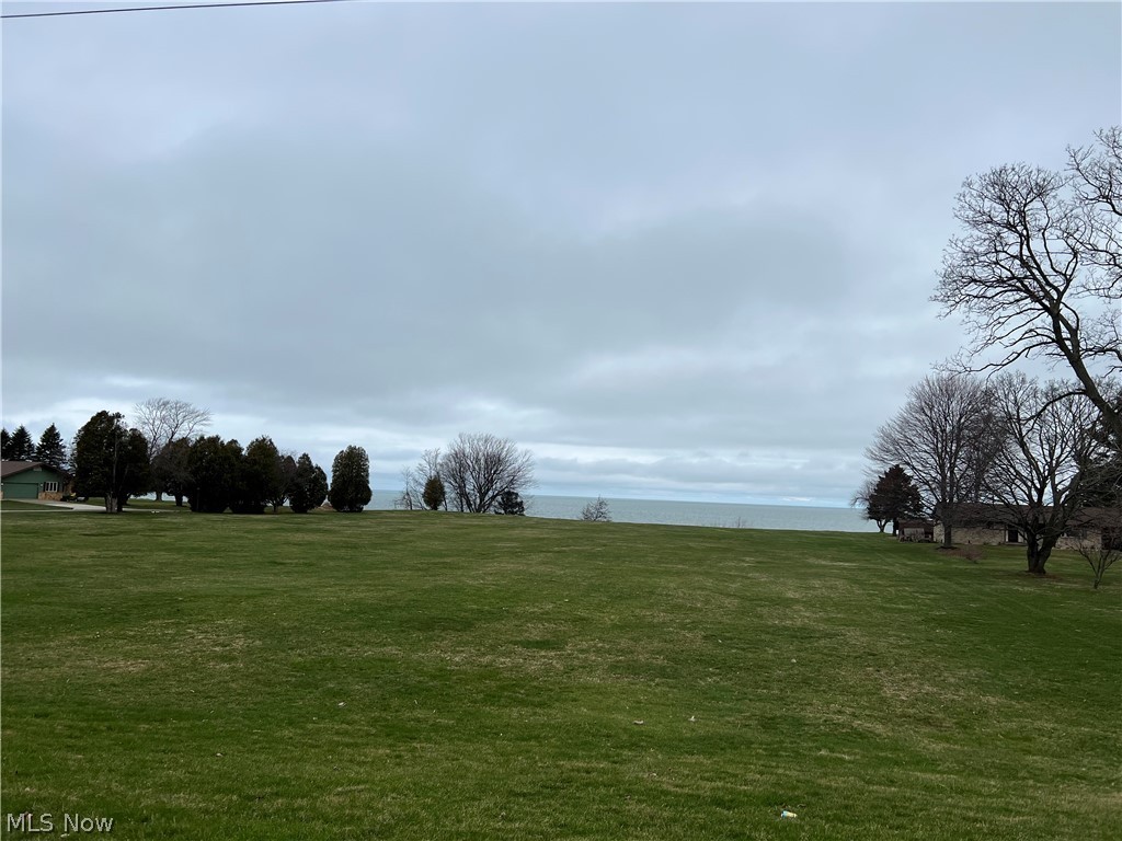 A very rare find on the shores of Lake Erie. Build your dream home on this 4.76 Acre lot. Enjoy the sunrise and sunset with great views of the Lake. This lot is ready for a new home with electric, gas and water at the street. This lot will require a septic system. You are minutes from the boat clubs and great restaurants. Lot size is 277' frontage and 843' depth. This building lot is surrounded by beautiful homes. This beautiful lot won't last long.