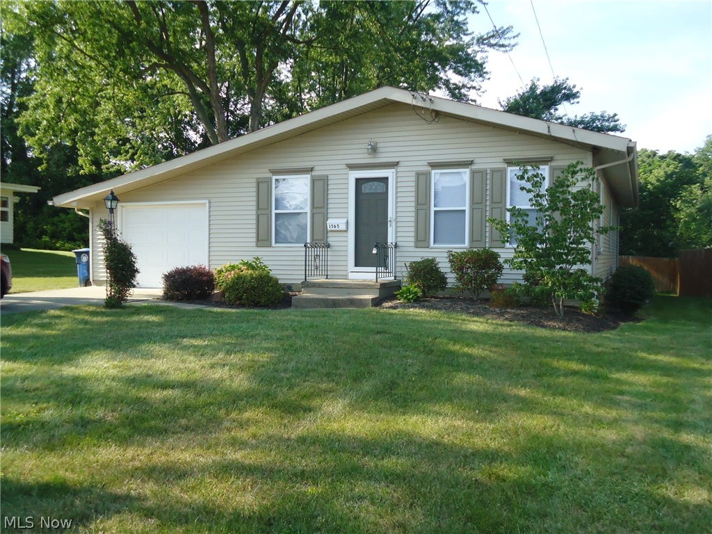 Move-in Condition!!!!!! Easy living 3 BR/2.5 BA Ranch style home in convenient location near schools, shopping and parks. Gorgeous hardwood floors throughout!! Fresh, neutral décor. Newer windows, doors, electric, furnace, central air, crown molding, 6 panel interior doors and updated kitchen with appliances. Large bedrooms with double closets. Huge (46 feet long) waterproofed basement with half bath, perfect for storage or additional living space!
1 car attached garage with storage and concrete patio too. 1 year Home Warranty included. Call today for your private showing.