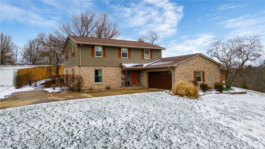 Step into this meticulously maintained home that exudes pride of ownership. This residence, situated in the highly coveted Hiddenwood neighborhood, is a testament to quality living. Imbued with natural light, the 4-bedroom (potentially 5), 3.5-bath layout is perfect for modern living. The main level showcases a formal living room, a separate dining room, and an updated eat-in kitchen adorned with stunning quartz countertops, a stylish backsplash, and stainless steel appliances. The bay window offers a picturesque view, creating a delightful culinary experience. The adjoining family room is both welcoming and warm, featuring a brick fireplace and double glass doors leading to the patio. Discover versatility in the bonus room, illuminated by skylights – an ideal space for a home office or an additional bedroom. Ascend to the second floor, where four bedrooms await, complemented by a beautifully updated main bath and master bath. The master bedroom boasts its own full bath, ensuring comfort and convenience. An exceptional highlight is the custom-built rec room, showcasing handcrafted live edge wood and a built-in bar area that exemplify exquisite craftsmanship. This recreational haven also accommodates another full bath and a separate laundry room, providing both functionality and luxury. Storage is abundant throughout, and recent upgrades include a brand-new roof in 2022 and a hot water tank installed in 2023. Curb appeal is undeniable, with meticulously kept landscaping enhancing the fenced-in backyard. Whether you're entertaining in the rec room or relaxing on the patio, this home offers a perfect blend of comfort, style, and practicality. Don't miss the chance to make this your dream home!