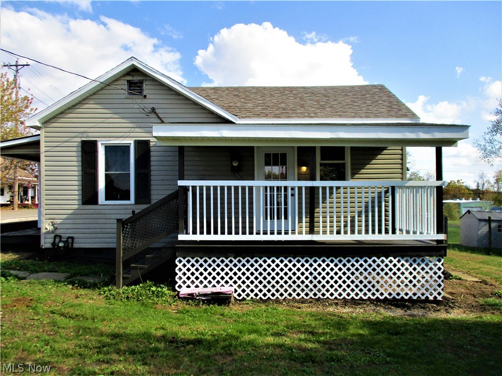 Completely remodeled 2 bedroom home for sale in Beallsville. Home has been stripped down to the studs and put back together. Updates include insulation throughout the entire home, all new wiring/receptacles/ switches, upgraded 200 amp service, New 3D HD Shingles, new furnace, new central air, all new duct work, new hot water tank and all new light fixtures. Also has all new flooring installed throughout the home, new drywall/paint, new bathroom shower/vanity/toilet, new custom made Maple Amish cabinetry in the kitchen, new interior/exterior doors, faucets, plumbing and sewer lines. Home sits on a nice level yard with on street/off street parking and an alley to the rear for additional access. Priced to sell fast so don't miss out!