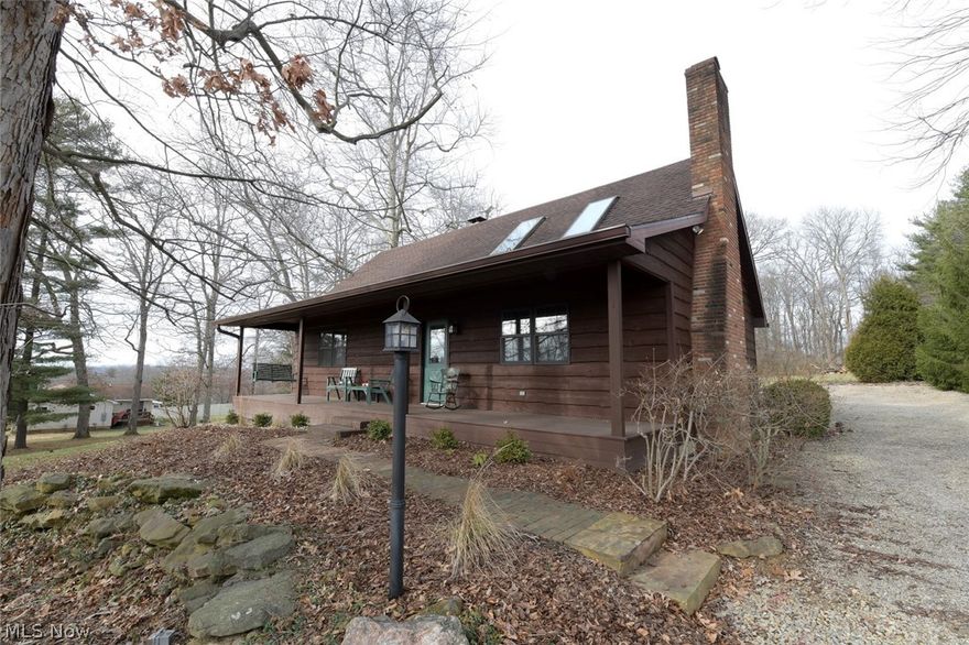 Beautiful Setting in Falls Township and Zanesville City Schools you will find this VERY well kept and beautiful Home.   Main level offers hardwood flooring throughout,  living room with vaulted ceiling and two skylites, open to kitchen with island , fireplace is wood burning with gas start, laundry room, Large bedroom with Full bath.  Upstairs is a bedroom with full bath and open loft.  
Lower level is partially finished with walk out to garage that offers a loft above the oversized 2 car garage
Breezeway between garage and house.  Additional workshop building.
House painted (8/28/2015)
New gutters installed (9/4/2020) . Gutters cleaned every spring and fall.
Sidewalk and one catch basin installed by CP Lawncare (11/14/2020)
Catch basin #2 and drainage installed by CP Lawncare (11/11/2021)