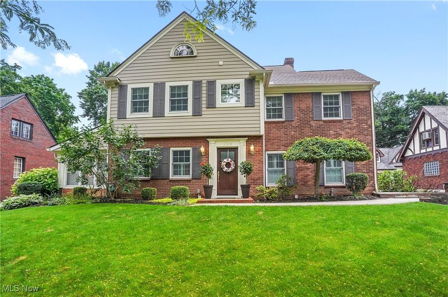 Welcome to this beautiful 4-bedroom, 2.5-bath Colonial in one of West Akron's most sought-after neighborhoods. Brimming with 1920s charm & modern updates, this home is a perfect blend of classic elegance & contemporary comfort. Before you step inside, you'll be impressed by the home's curb appeal, newer Hardie Board siding, roof & professionally designed hardscaping/landscaping. A newer driveway with ample parking, grilling station, & patio. Inside, the home boasts large rooms, numerous windows to bring in natural light, hardwood floors, & classic architectural details; crown molding & elegant archways. Walking in, you are greeted by the spacious family room featuring built-ins & a gorgeous gas fireplace. It is open to both the dining room & office, creating a warm & inviting flow. The office is perfect for working from home. Off the dining room, enjoy a sun porch. The kitchen features white cabinetry, a breakfast nook with a built-in china cabinet & a sliding glass door that opens to a greenhouse—perfect for growing herbs or vegetables all year. A convenient half bath & attached 2-car garage complete the first floor. The spacious second floor offers a large primary suite with two closets & recently updated en-suite bathroom featuring a large shower. Additionally, there are 3 bedrooms with walk-in closets, a cedar closet, built-in cabinet & a second updated bathroom.  The lower level includes a recreation room with egress windows, a laundry room & three additional storage areas. Additional features/updates: Plantation shutters, Anderson windows, electric fence, ceiling fans, boiler, exterior electric, entryway tile, interior paint. Situated in the desirable Palisades neighborhood, this home is part of the Firestone Community Learning Cluster: King Elementary, Litchfield Middle, and Firestone. Enjoy quick access to local favorites like Highland Square, Stan Stan Hywet, & metro parks. This home is a rare find—timeless charm, modern updates, & an unbeatable location.