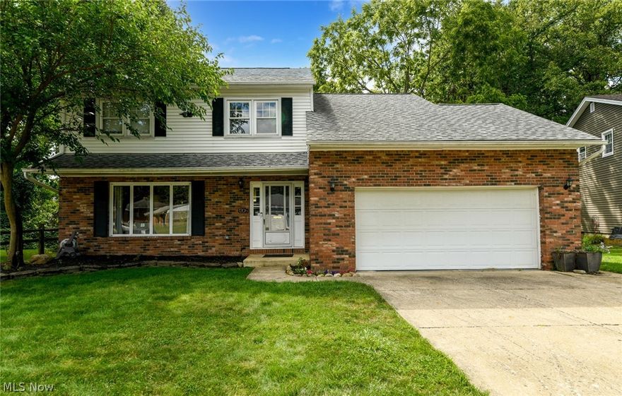 Adorable and spacious 4-Bedroom 4 Baths Colonial home, on a nice wooded lot overlooking the Sand Run Metro Parks & valley. Comfortable size living room, formal dining room, kitchen with Oak cabinets, Stainless Steel Appliances, and a large family room with a wood-burning fireplace. Sliders off the Family Room lead to a bright and gas-heated 4-Season Room. Hardwood Floors in Living Room, Dining Room, Family Room, and All 4 Bedrooms. The lower level has a large finished and just-carpeted Recreation space, laundry, full bathroom with jetted tub with separate shower, and a Cedar Closet. Additional features include a roof (2009), insulation over garage, some newer windows, glass block windows in basement, High-Efficiency Furnace, and Ceiling Fans throughout. 2-Car Attached Garage, Huge Private Backyard and a Storage Shed.