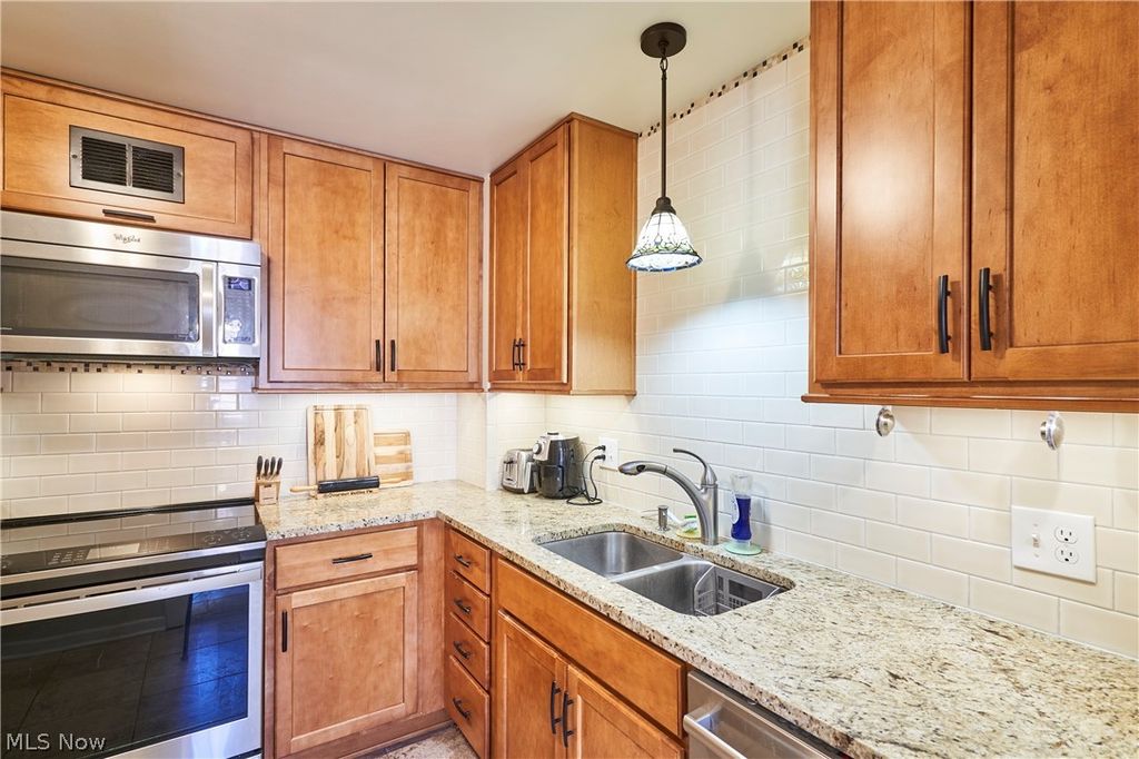 Photo of 18975 Van Aken Boulevard #411, Shaker Heights, OH 44122 (MLS # 5198552)