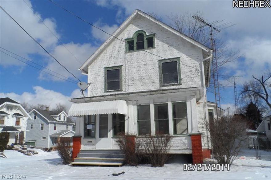 Two story home with nice floor plan.  large living room with beautiful woodwork details and formal dining room.  Eat in kitchen and three bedrooms.  Small backyard but there is a detached garage and a shed. Sold as-is.  Buyer to verify all information.  Equal Housing Opportunity.  Owner Occupants only until 3/14/14.