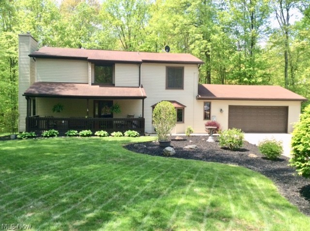 Don't miss this exceptional 4 bedroom 2 full 2 half bath vinyl sided colonial situated on a park like setting on a cul de sac. Applianced kitchen with pantry plus a breakfast bar into the family room. 1st floor laundry. Glass doors off the kitchen to a 3 season sun room with sky lights overlooking the patio and fire pit surrounded by a private wooded area. Replacement windows & doors. Siding 2011. Waterproofed finished basement with a ventless gas fireplace and beautiful custom built wet bar great for entertaining. Includes two bar refrigerators, one that can convert to a freezer. Glass block windows in the basement. All this and a 13' X 23' workshop attached to the garage for the handyman. Workshop access through the garage or from the outside. Within walking distance to schools. This home is beautifully maintained and shows pride of ownership.