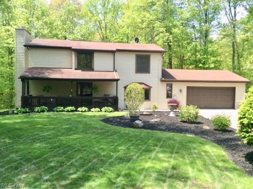 Don't miss this exceptional 4 bedroom 2 full 2 half bath vinyl sided colonial situated on a park like setting on a cul de sac. Applianced kitchen with pantry plus a breakfast bar into the family room.  1st floor laundry. Glass doors off the kitchen to a 3 season sun room with sky lights overlooking the patio and fire pit surrounded by a private wooded area.  Replacement windows & doors.  Siding 2011. Waterproofed finished basement with a ventless gas fireplace and beautiful custom built wet bar great for entertaining.  Includes two bar refrigerators, one that can convert to a freezer. Glass block windows in the basement.  All this and a 13' X 23' workshop attached to the garage for the handyman. Workshop access through the garage or from the outside. Within walking distance to schools. This home is beautifully maintained and shows pride of ownership.