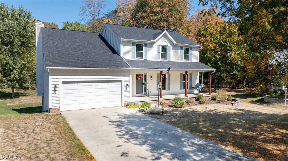 Exceptionally updated and meticulously maintained colonial available in Tallmadge! Welcoming covered front porch invites you into the homes spacious interior. Flanking the foyer you'll find a large formal living room (currently used as an office). The living room opens to the stylish formal dining room. Off the dining room you'll enjoy a stunning updated kitchen with high end soft close cabinets, granite counters and stainless appliances. Kitchen opens to to a lovely family room with a fireplace, offering plenty of space to gather and entertain. French doors in the kitchen lead to an expansive back deck overlooking a private back yard with plenty of room to run around and woods beyond. Back inside, a conveniently located half bath finishes off the first floor. Upstairs you'll fins a massive primary suite complete with a huge walk in closet, and gorgeous en suite bath with a separate shower and soaking tub. Down the hall are 3 very good sizes bedrooms all with great closet space, and an additional guest full bathroom. Impressive lower level with full sized windows include a comfortable rec room and a huge 5th bedroom with a walk in closet. The lower level also offers a great amount of storage and laundry room. Updates throughout the home including all new 3 pane UV blocking windows and front door in 2022, water tank in 2025, new roof 2022, new HVAC in 2019, new gas range in 2025. Property is situated in a beautiful residential neighborhood at the end of a charming cul-de-sac. Nothing to do but move in! Dont miss it!