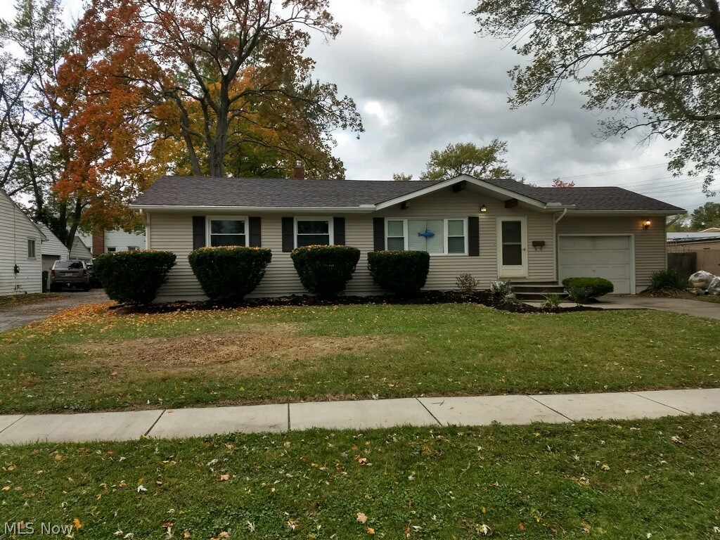Come take a look at this three bedroom ranch in a quiet Cuyahoga Falls Neighborhood. You will fall in love with the high ceilings and open floor plan as soon as you walk in the door. Improvements include all new kitchen with new flooring, cabinets with soft close drawers, new granite counter tops and brand new stainless steel appliances, new roof with extended gutters, fresh paint and new carpet throughout. Entertain on the freshly stained deck and enjoy your large fenced in back yard. New furnace, AC and humidifier in 2018. Large basement with many possibilities. This one won't last long.
