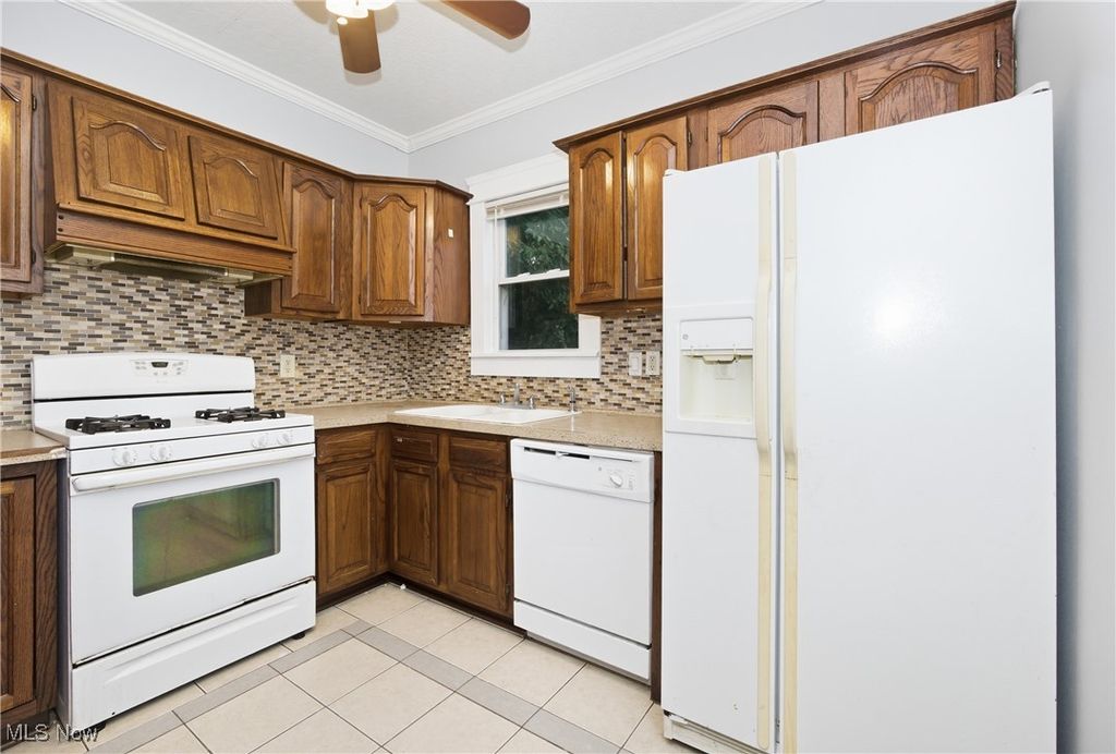 Photo of 3227 Trowbridge Avenue, Cleveland, OH 44109 (MLS # 5168341)