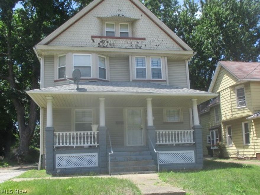 Large Classic Cleveland Colonial is a Must See!! This home features 3 bedrooms; full bath with over 1680 sq ft. Nicely sized living room with hardwood floors. Formal dining room with built ins to show off your collections and a great place to entertain your guests. Kitchen provides an abundance of cabinetry. Full basement for extra storage with glass block windows. Attic could be finished off to add to more living space. Large front porch to relax on during the warmer months. Great area with lots of charm and character. Close to many amenities CLE has to offer with sports arenas; restaurants and shopping. Schedule your showing Today and make this your home!!