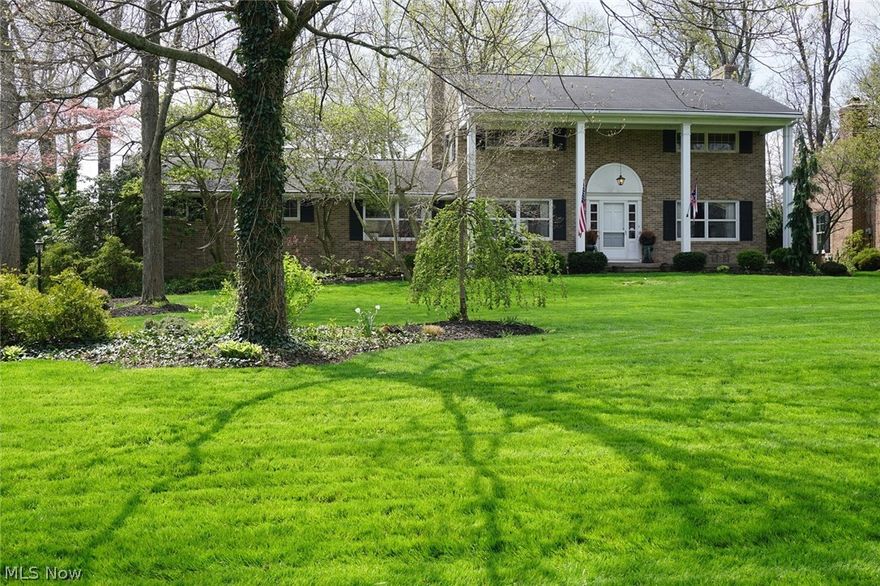 Hurry to see this spacious brick home in desirable Steiner Heights! Offering over 3,300 total sqft, 4 BRs, 3.5 BA, with multiple living areas -- all on a beautiful, park-like lot.  Large living room with fireplace opens through French doors to a beautiful study with hardwood floors & lots of windows.  The dining room has built-in corner cabinets. Fully applianced kitchen has hardwood floors & newer granite countertops. Large family room with fireplace offers another living area. The second floor has great master BR with vaulted ceiling, private bath and 12' x 9' walk-in closet! BR #2 has private attached full bath as well.  Rec room and TV area in basement provide even more space!  Lovely stone patio overlooks beautiful yard with mature trees. Hot tub included! Located within easy walking distance to the Hoover Trail and Washington Square dining and shopping.
