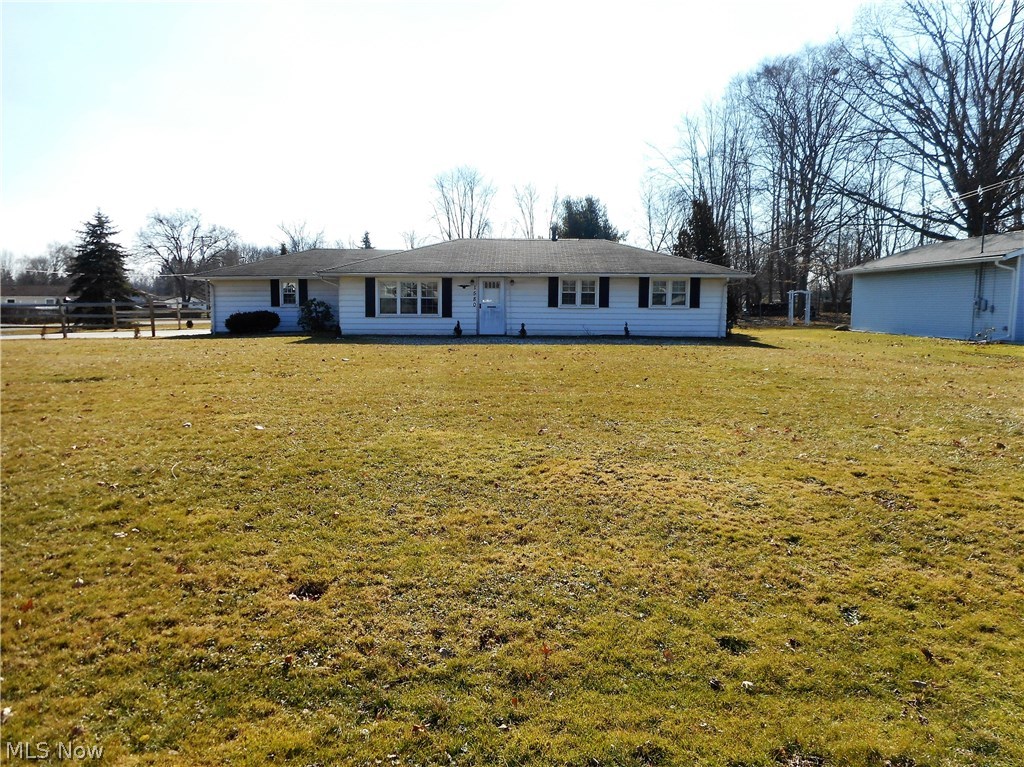 Well maintained 3 bedroom ranch with Hardwood floors in Dining room, living room and all bedrooms, ceramic floor in kitchen and bath. Ceiling fans in all rooms, plus central air in 2013. New roof and seamless gutters in 2013, New Driveway and garage floor in 2014, Furnace (Carrier), hot water tank, Vinyl Windows in last five years. Double towel racks in bath and other nice features that makes this home ready for immediate occupancy. Extra large lot with room to expand house. Covered patio, shed. Home is handicap accessible.