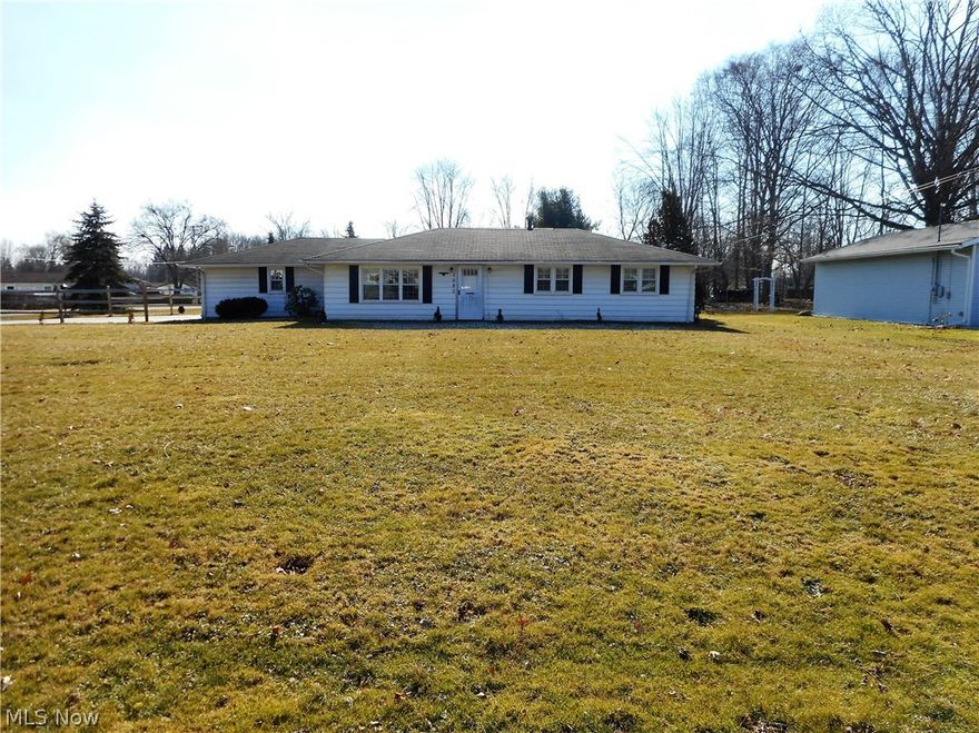 Well maintained 3 bedroom ranch with Hardwood floors in Dining room, living room and all bedrooms,  ceramic floor in kitchen and bath. Ceiling fans in all rooms, plus central air in 2013.  New roof and seamless gutters in 2013, New Driveway and garage floor in 2014, Furnace (Carrier), hot water tank, Vinyl Windows in last five years.  Double towel  racks in bath and other nice features that makes this home ready for immediate occupancy.  Extra large lot with room to expand house.  Covered patio, shed. Home is handicap accessible.