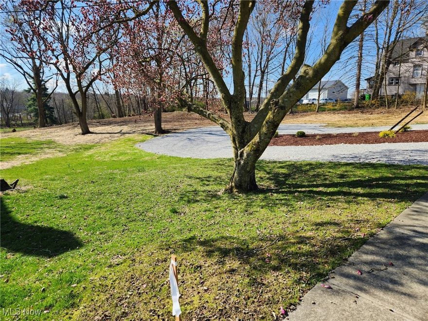 Currently zoned light industrial - commercial. Possibilities for Storage Buildings, Apartments, or Commercial building. Conveniently located near Tallmadge Circle. 
1.42 Acres with 124 Ft. frontage. 
Please call Tallmadge Zoning regarding any zoning questions.