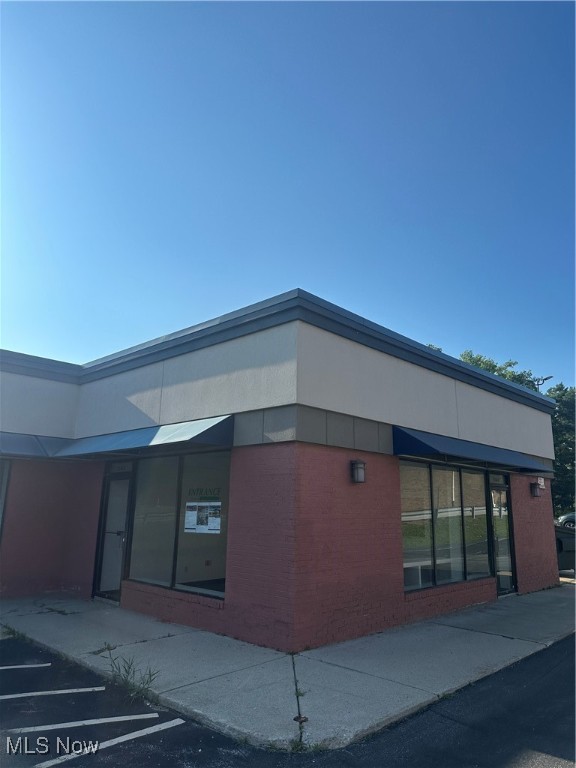 Rear units with front street signage in prime location in turnkey condition, 800 SF, 1800 SF, or 2,600 combinable SF. Across from Pleasant Valley Shopping Center, a stone's throw from Starbucks and other national high-traffic tenants. Ideal for professional services and office users who want to be in a great location with low rent and don't require high visibility. The smaller unit is in white box condition, and the landlord is waiting to do the floors for the next user. The larger unit has an existing buildout in good condition.
