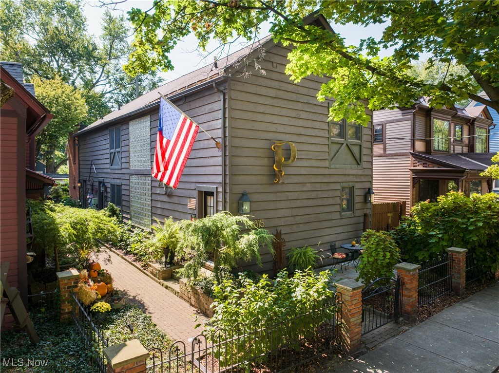 Location, location, location! You will be very impressed by this gorgeous updated luxury duplex with central air skylights, vaulted ceilings, & tons of character due to its roots as a blacksmith barn & shop: exposed original brick, exposed original wood beams, exposed bar wood feature walls. Located less than a 2 minute drive to West Side Market & The Flats: 5 minute drive to all sporting venues, Playhouse Square, & Cleveland State University: & less than 15 minutes to Cleveland Clinic, Case Western University, University Hospital, University Circle, & Metro Hospital! This cedar sided fully fenced property has a gorgeous private landscaped courtyard with landscape lighting & irrigation system; a 900 sq ft 2-story 1 bedroom 1 bath unit at the back of the property with private entrance, open floor plan, dinette area, living room with Vermont Stove style gas fireplace & sliding glass doors to the courtyard, kitchenette, 2nd floor lofted office, vaulted bedroom & updated en-suite bath; a 2100 sq ft front unit with private entrance, open floor plan, great room, updated kitchen, & original staircase to two 2nd floor bedroom suites (one with walk-in closet & common area or used to enlarge the living space of either or both units, or open it up completely to convert this duplex to a single family home. Kitchens, baths, windows updated in 2016-2018;roof, gutters & leaf guards replaced in 2020. Great executive Rental!