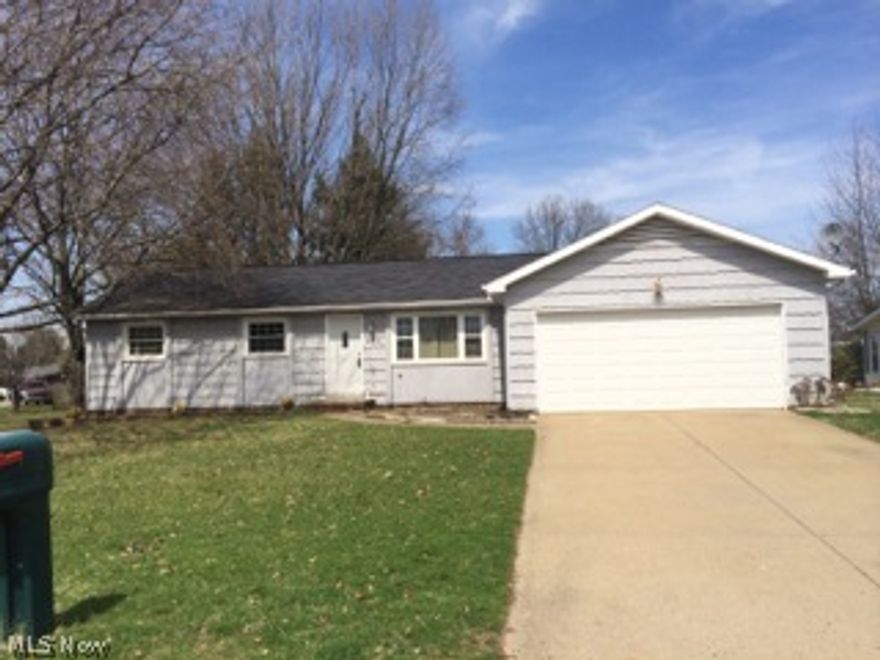 You are HOME! This home has a beautiful lot with mature trees and a wonderful backyard to spend your evenings around a cozy fire with family and friends. Along with having a nice size living room, this home has a great family room with a full brick wall and fireplace with easy access to the backyard. 3 nice sized bedrooms, bath and kitchen complete first level. The light and bright lower level is framed and ready to go for a great added family area or man cave. Close to I 77 and the beautiful Village of Zoar!