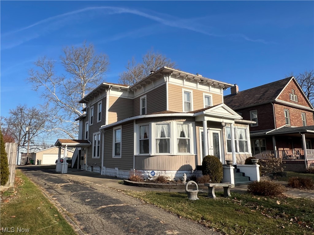 Excellent investment opportunity! Up & down, vinyl sided duplex with great income potential. Live on the main floor and rent out the second floor! Vinyl replacement windows. Main floor unit features 10' ceilings, living room with decorative fireplace and french doors to the dining room, corian counters in the kitchen, whirlpool tub and separate shower in the full bath and 2 bedrooms. The main floor includes the lower level with corner gas fireplace in the living room, laundry hook-ups off the kitchen, 1 bedroom, finished storage room and full bath. 2nd floor unit features 9' ceilings, decorative fireplace in the living room, kitchen, 2 bedrooms and full bath. 24 X 24 garage with 12 X 16 storage area. Large level lot with plenty of off street parking and alley access at the rear. Convenient location, just a few blocks from the square of Dover. Also listed as single family, see MLS#5020086.