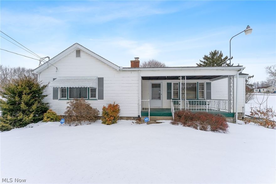 Situated on just under 3 acres, this spacious home at 5160 St., Louisville, Ohio combines rural serenity with practical living. Featuring durable vinyl siding and a dimensional shingle roof, the property also offers a rare 4 car garage for vehicles and storage. Inside, the kitchen showcases solid wood cabinets, laminate countertops and flooring, and an eat-in area, while a large, carpeted dining room flows into the living room, complete with a decorative fireplace and a coved ceiling. 3 carpeted bedrooms on the main level provide comfort and convenience. Full bathroom with tub and tiled walls. Theres a bonus 1/2 bath on the main floor as well. The basement is partially finished with a living area and bar. Theres another extra storage room with sump pump, 200-amp panel, pressure tank and water softener, a fruit cellar, and a laundry area with tile flooring and glass block windows. Additional highlights include private well and septic system, making this a wonderful opportunity for those seeking space, functionality, and country living. Make this house, your home!