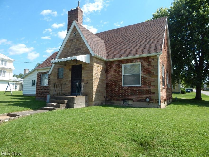 SPRING STREET SPECIAL!
3 Bedroom, 1.5 bath brick home on a corner lot in Harrisville!  Two detached garages for plenty of room for parking or extra storage! With a little updating & your own personal touches, this affordable home can shine!