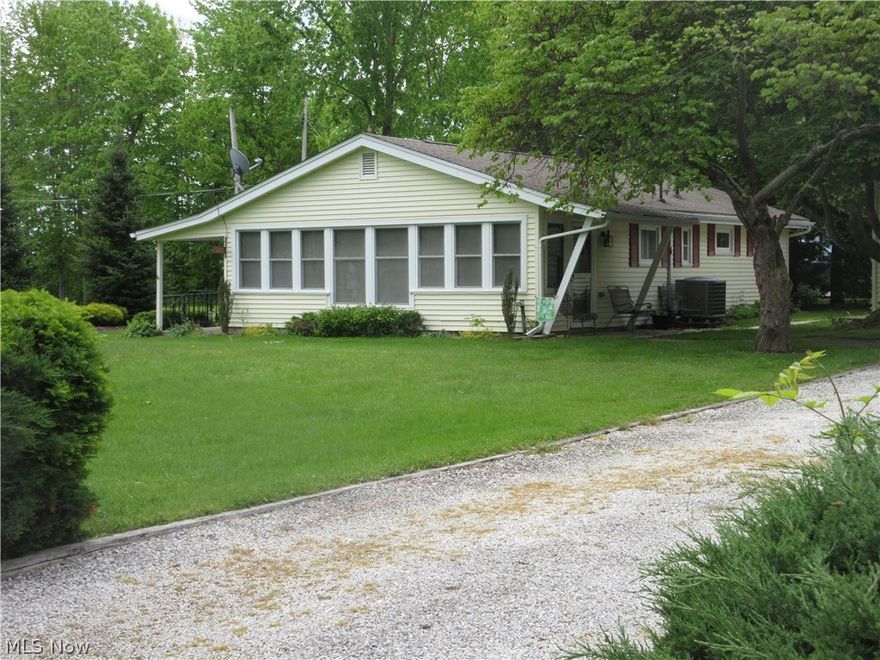 This cozy three bedroom, one bath summer cottage nestled on .295 acres, offers charm and relaxed living with a view of the lake. The three bedrooms are ideal for family, guests, or a peaceful home office. Home comes furnished.