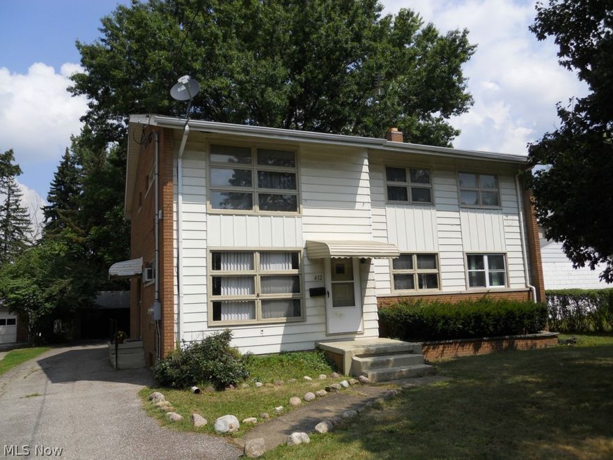 Authentic 3 bedroom  duplex located not far from Mill Creek Metro Parks. Spacious units, separate utilities except water/sewer. Ideal basement storage and laundry facilities. Separate entrances and garage accommodations. Live in one unit and rent the other or keep both rented as an investment property.  A lot of building for the money...call today!